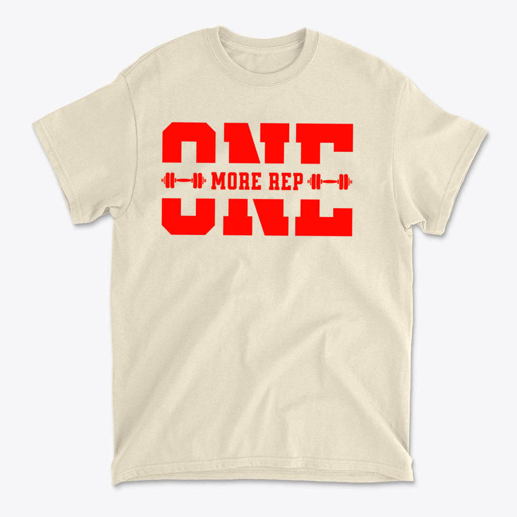 Always Push For One More Rep Now graphic tee in beige featuring bold red text.