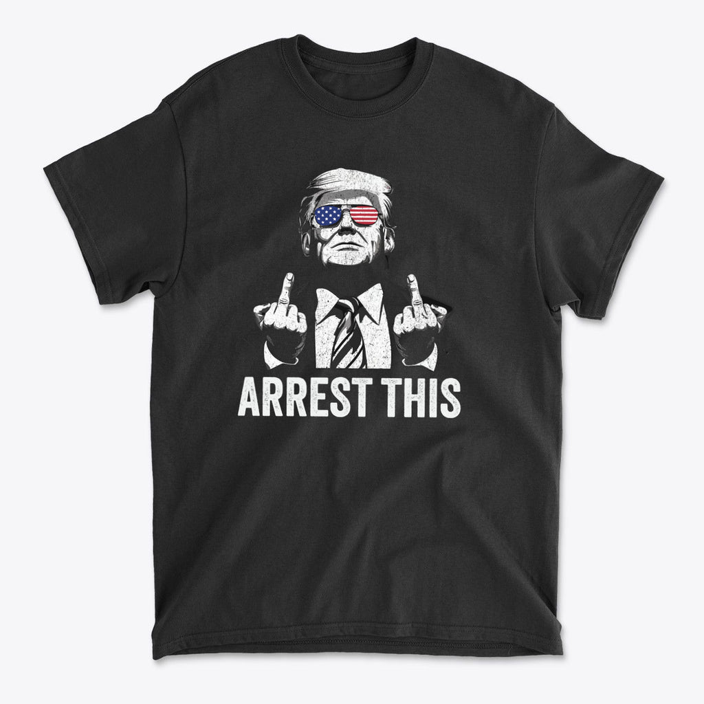 Graphic tee featuring a figure with sunglasses and text 'ARREST THIS', related to 'Why They Want To Arrest This Now' message.