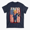 Trump Captures Maduro FAFO Now graphic tee featuring cartoon Trump with American flag background.