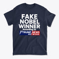 Fake Nobel Winner Graphic T-Shirt featuring bold text and humorous design on a navy background.