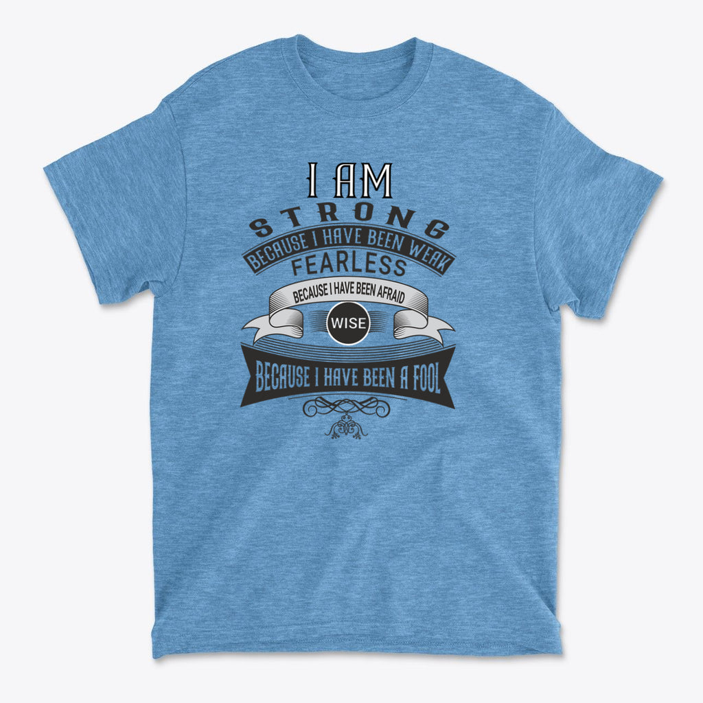 Strength Born From Past Weakness graphic t-shirt featuring empowering message in bold typography.