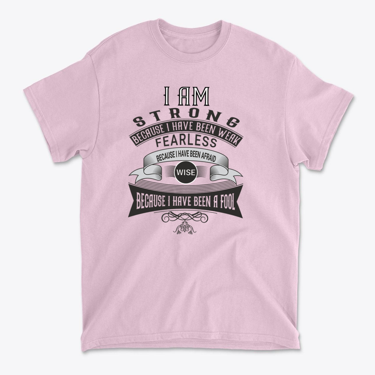 Strength Born From Past Weakness graphic t-shirt in pink with inspirational message about strength and wisdom.