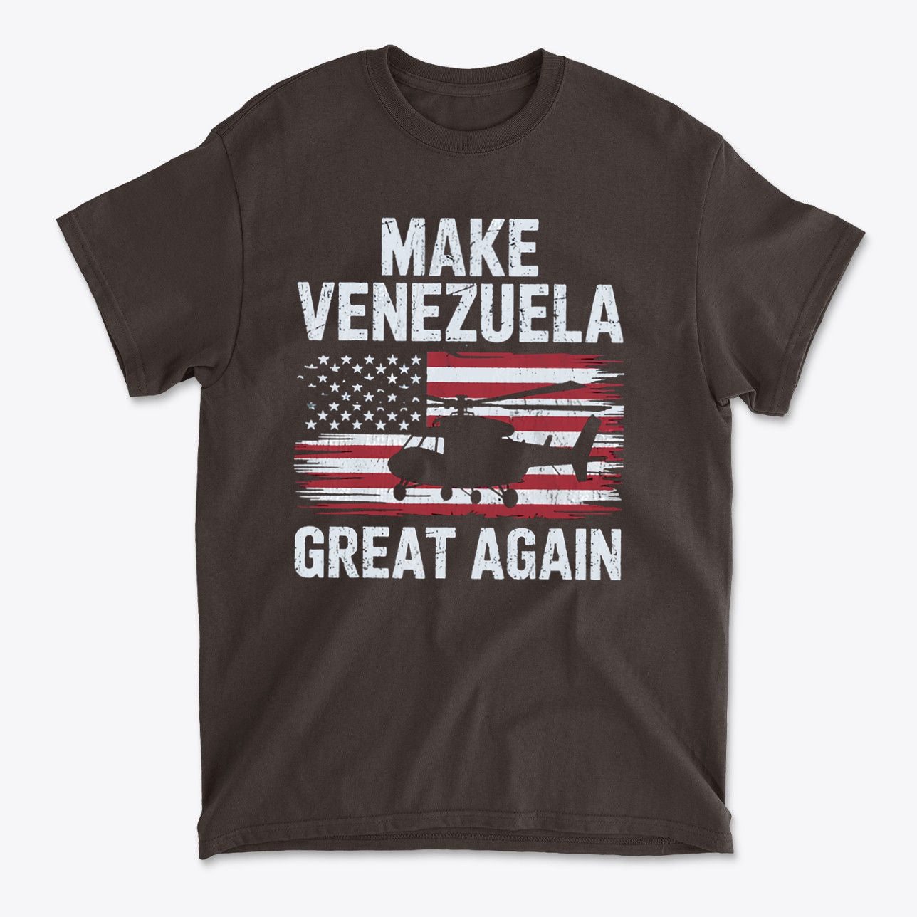 Graphic t-shirt featuring the phrase Make Venezuela Great Again With Helicopter against an American flag design.