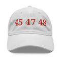 45 47 48 Trump Cap Red Word Art featuring red lettering on a white baseball cap.