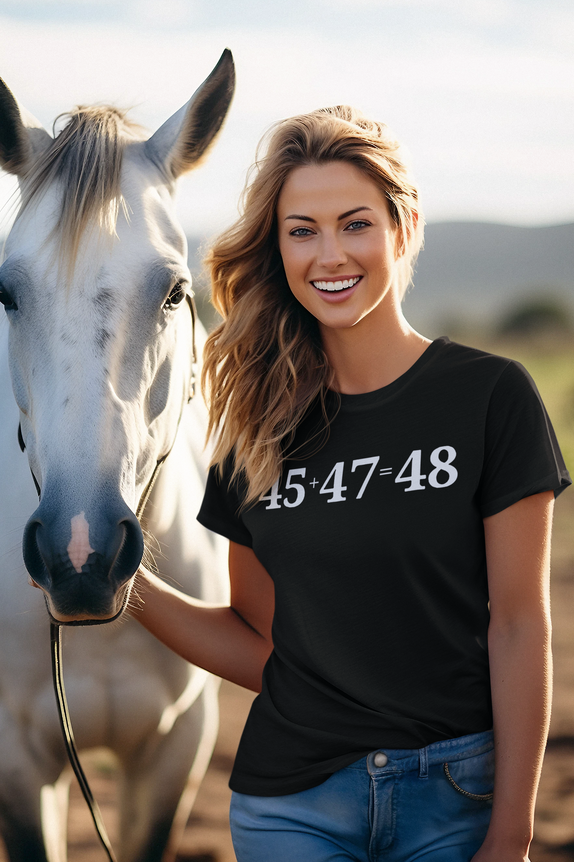 Woman smiling next to horse wearing 45 47 Equals 48 Red Letter Style graphic tee outdoors.