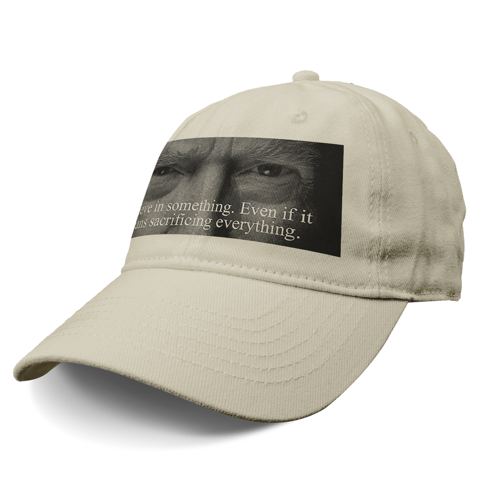 Trump Believe In Something Print cap featuring a graphic with a motivational quote on a light-colored hat.