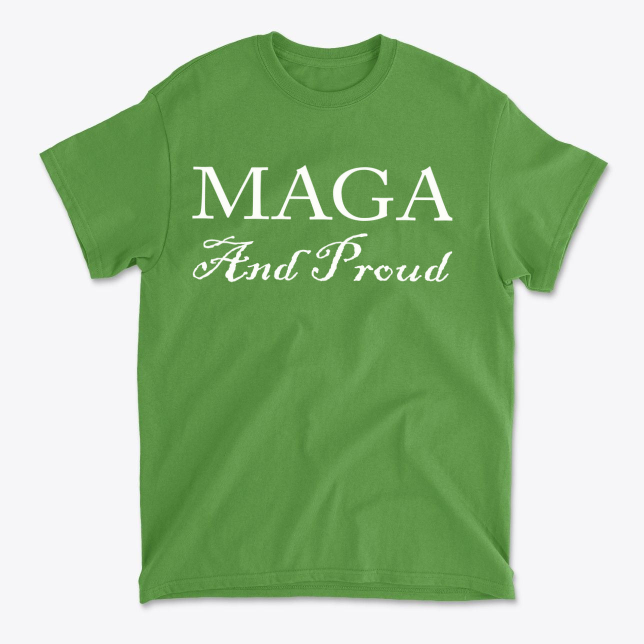 MAGA And Proud White Letters Style graphic tee on a green background, designed for expressing personal values.