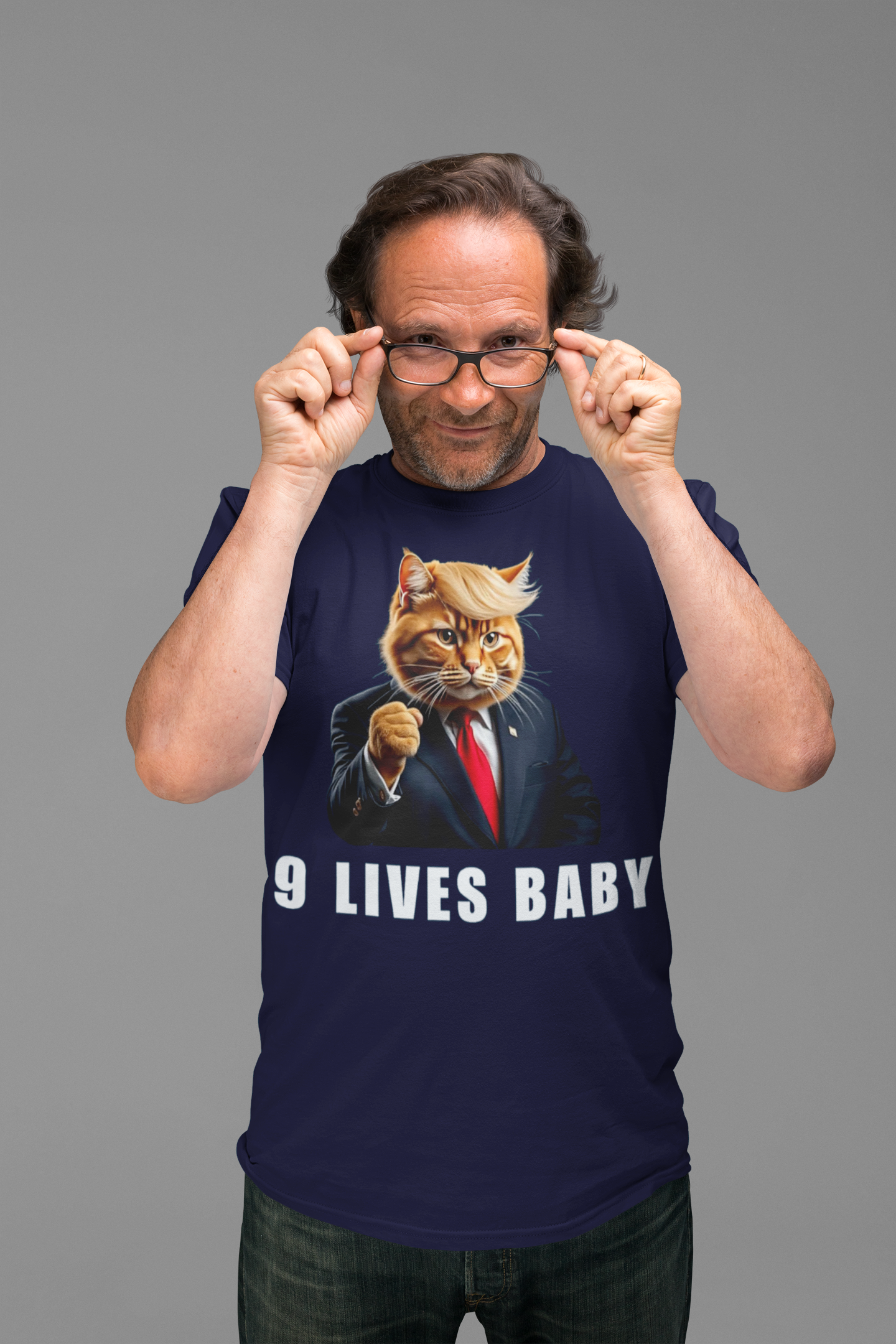 Man wearing a Nine Lives Baby Fist Art Style shirt featuring a cat in a suit.