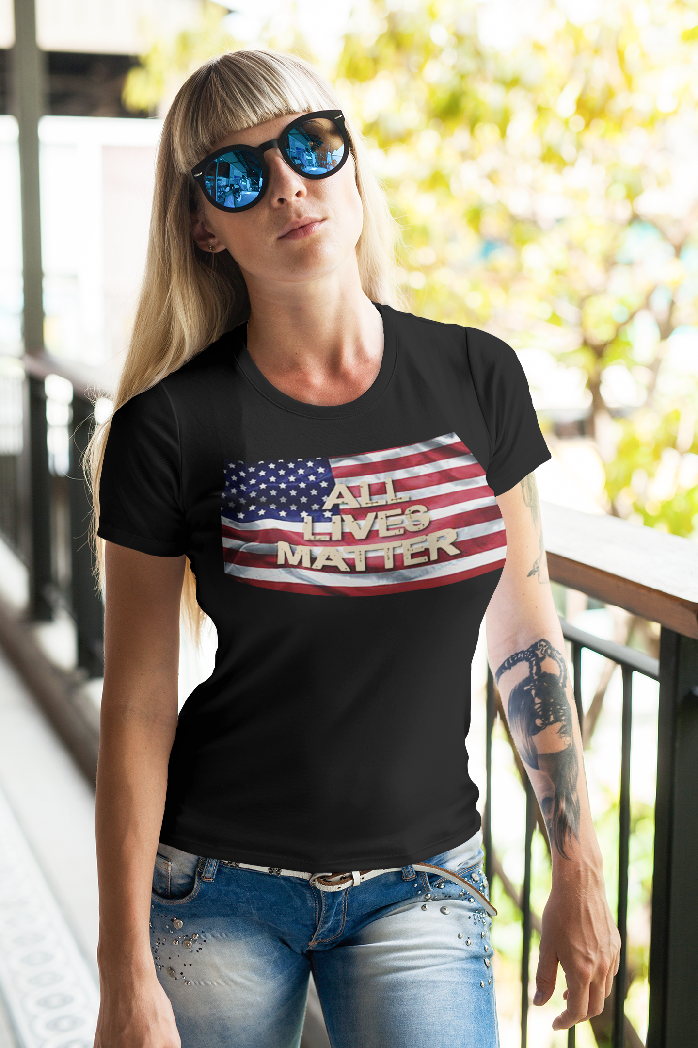 Woman wearing All Lives Matter On American Flag t-shirt, expressing patriotic values and bold statement.