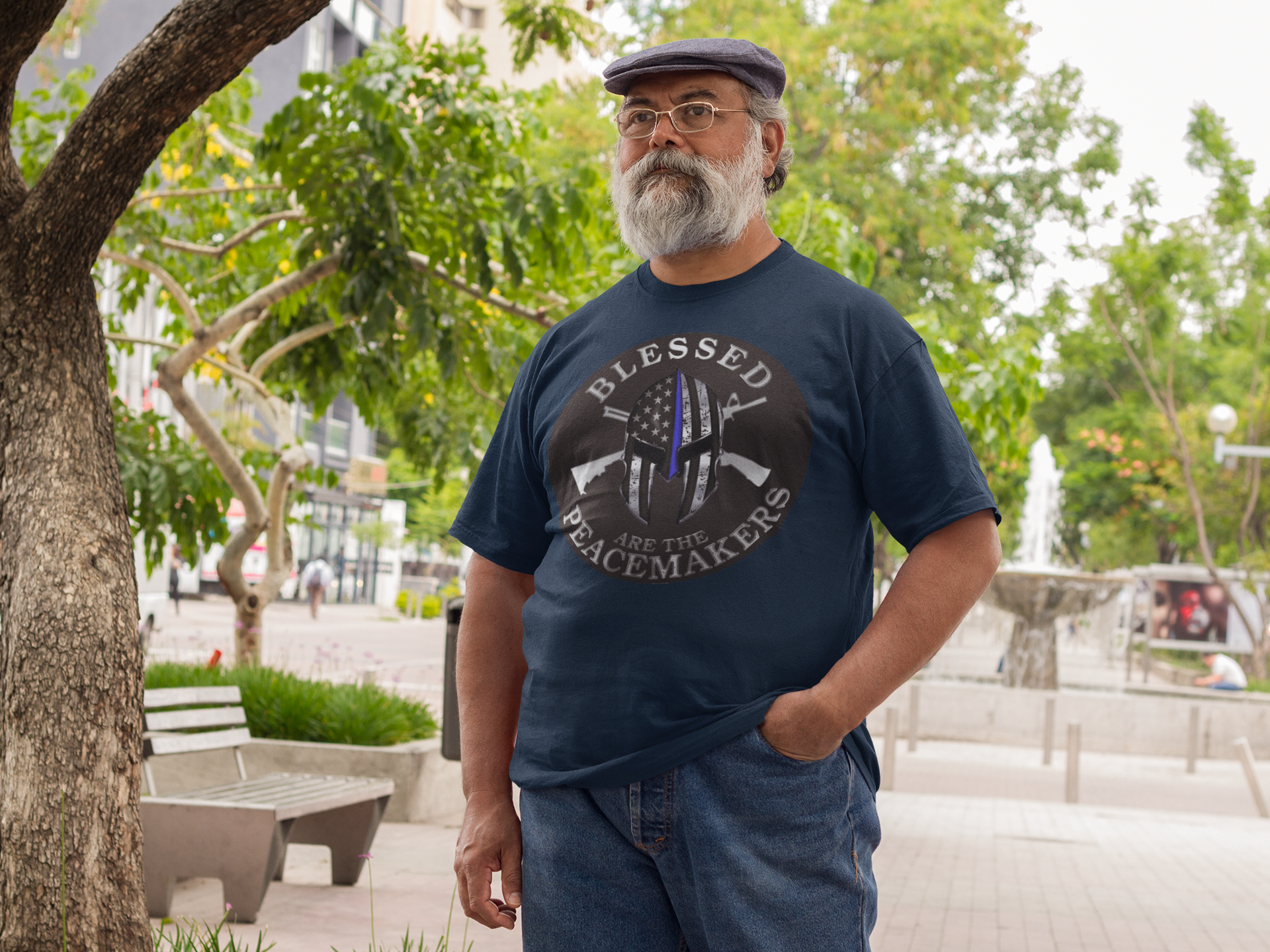 Man wearing Blessed Are The Peacemakers Punisher AR-15s t-shirt in park setting