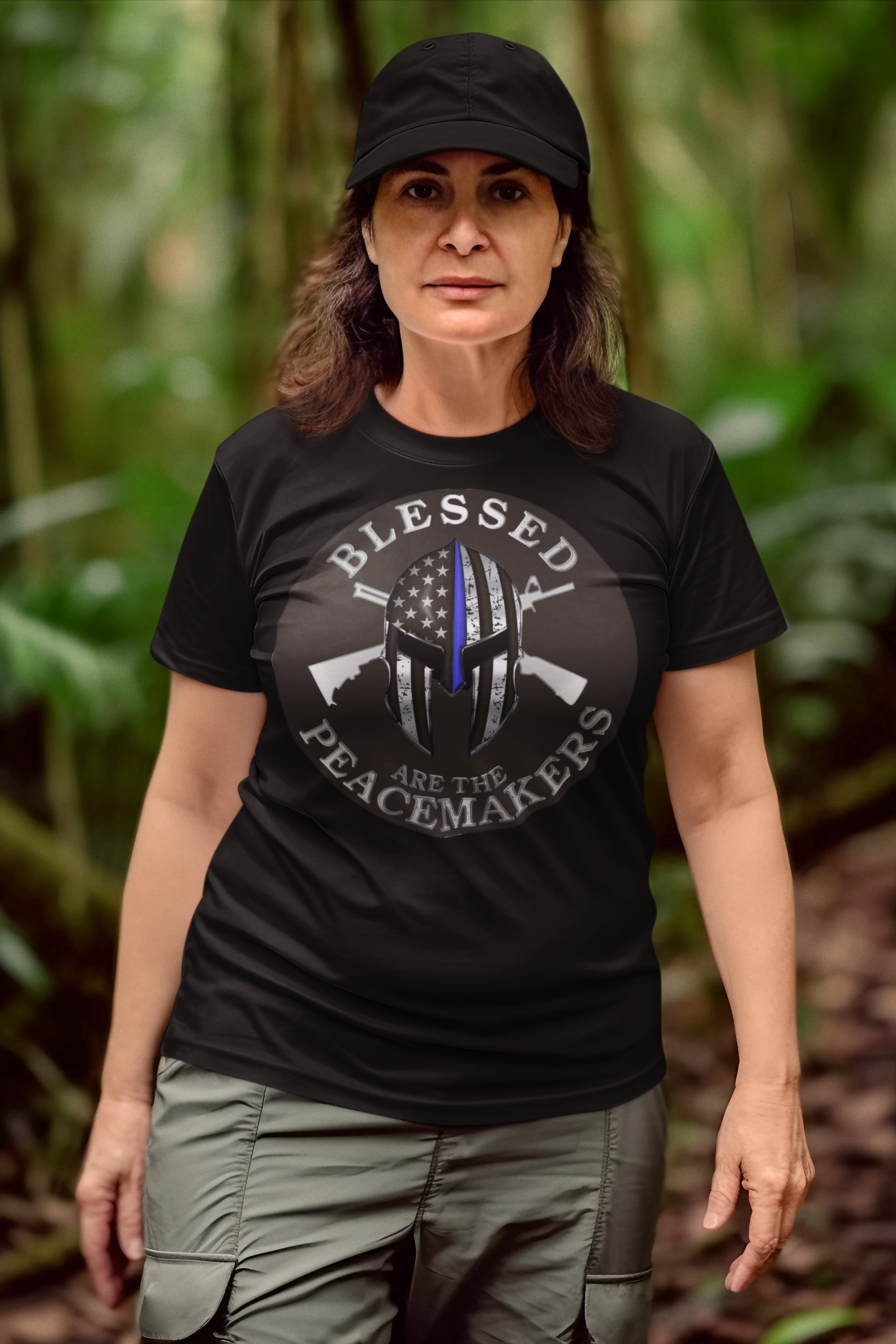 Woman wearing Blessed Are The Peacemakers Punisher AR-15s shirt in forest setting
