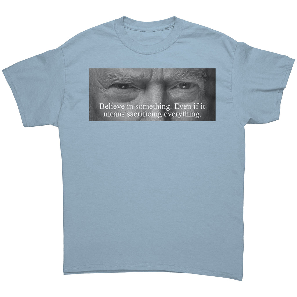 Believe In Something Even If It Means Sacrificing Everything graphic tee on a light blue shirt.