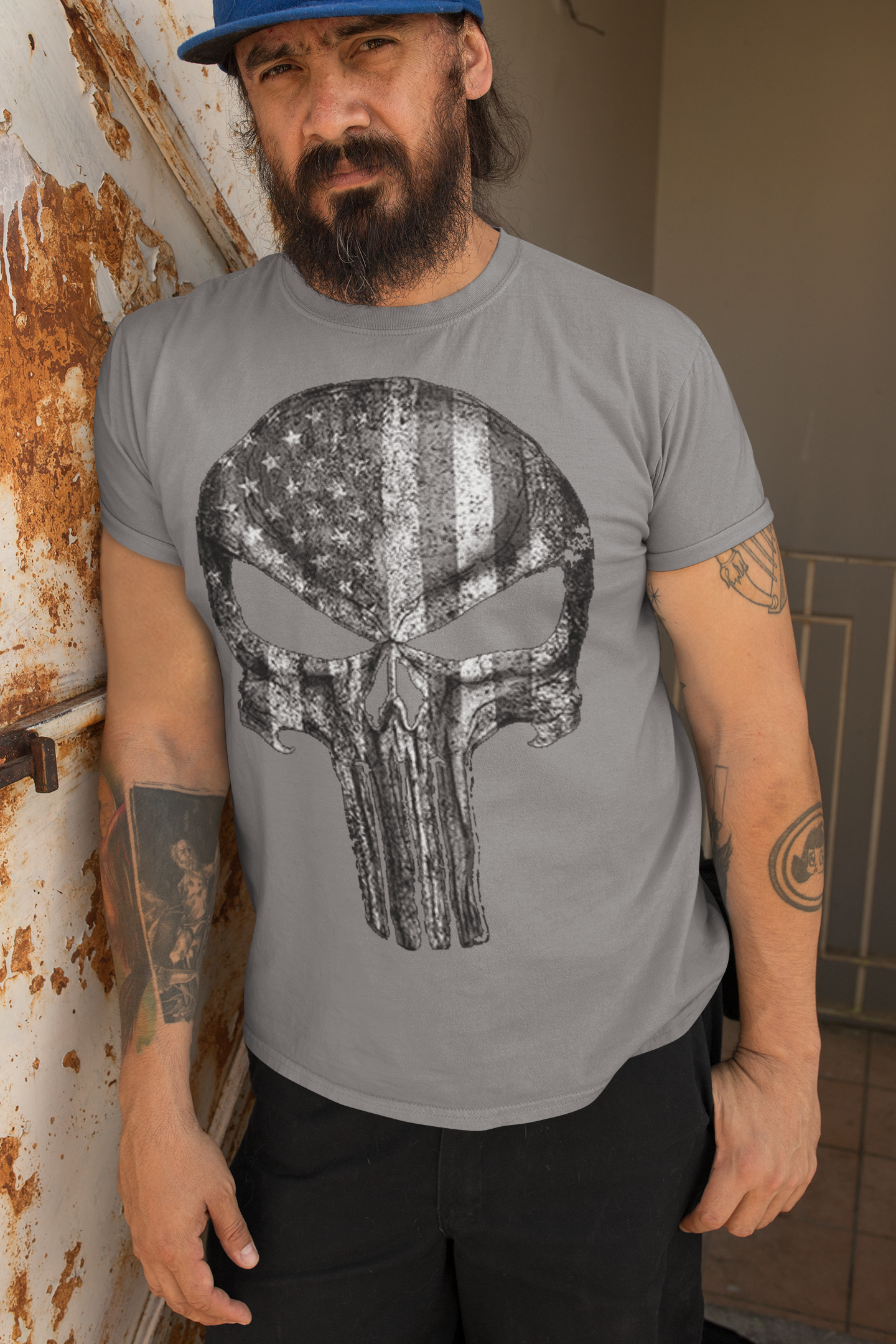 Man wearing Punisher American Flag BW Graphic t-shirt with distressed background.