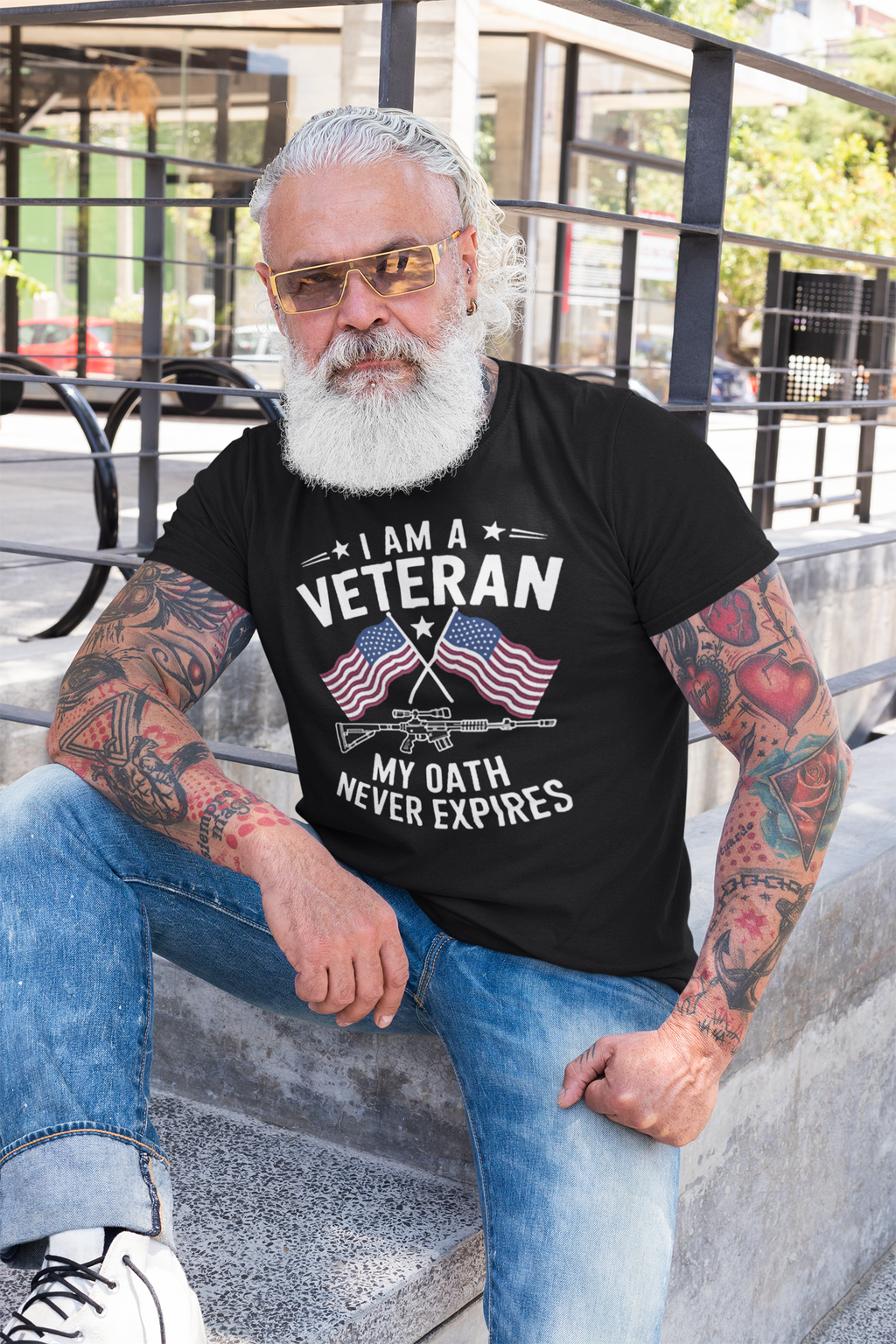 Man wearing 'I Am A Veteran My Oath Never Expires' t-shirt showcasing patriotism and commitment.