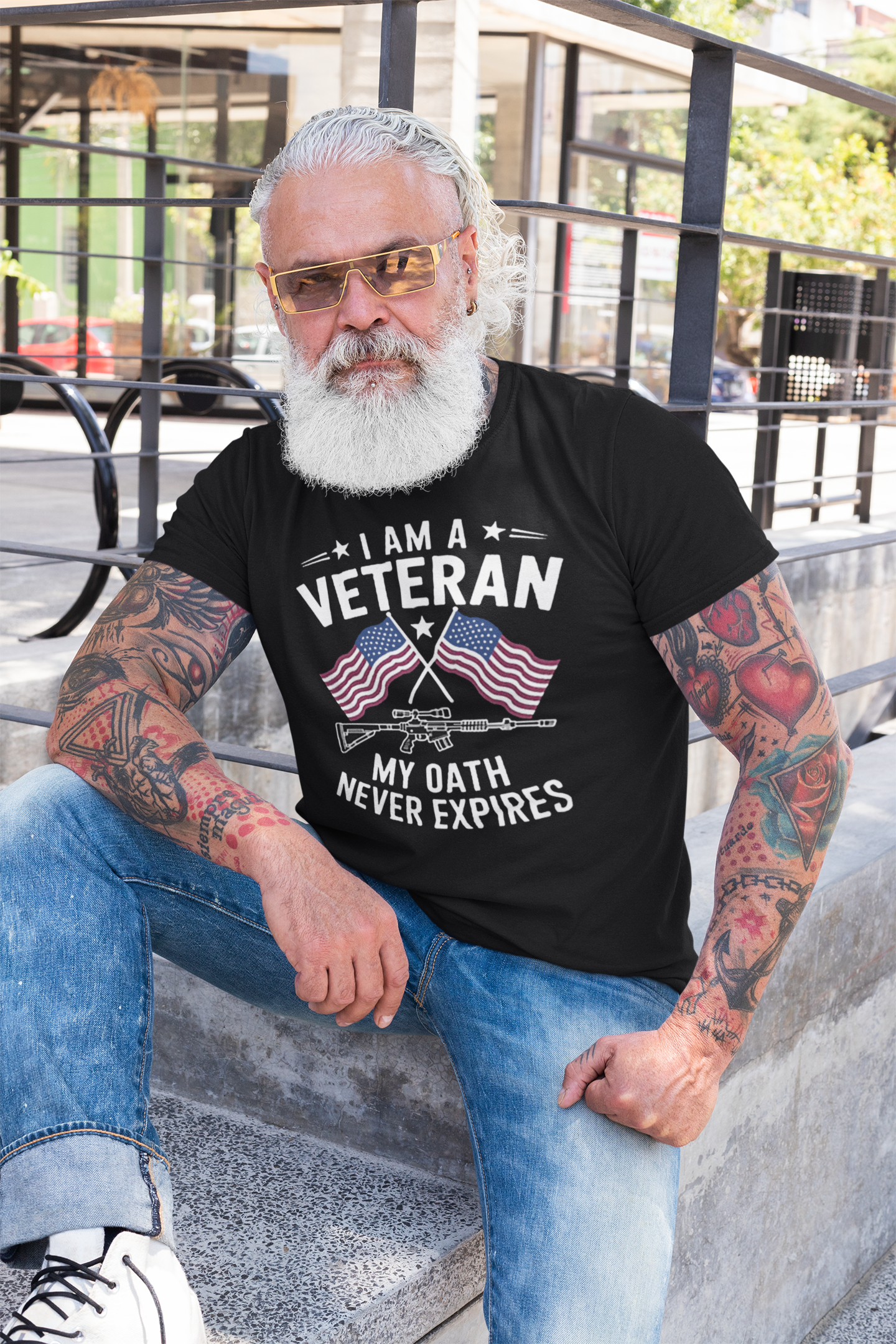 Man wearing 'I Am A Veteran My Oath Never Expires' t-shirt showcasing patriotism and commitment.