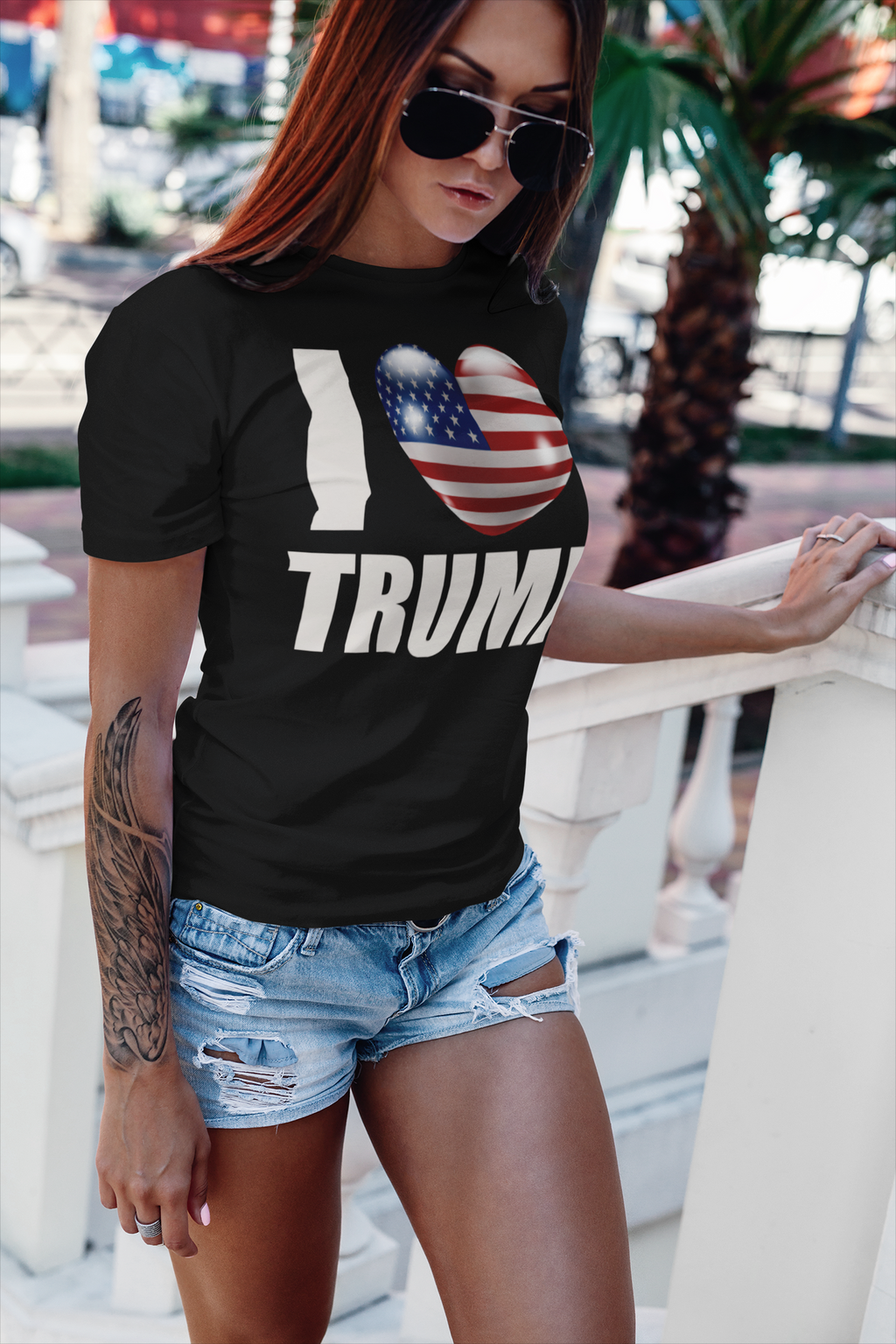 Woman wearing I Heart USA Flag Trump Classic Supporter Graphic Tee in black outdoors