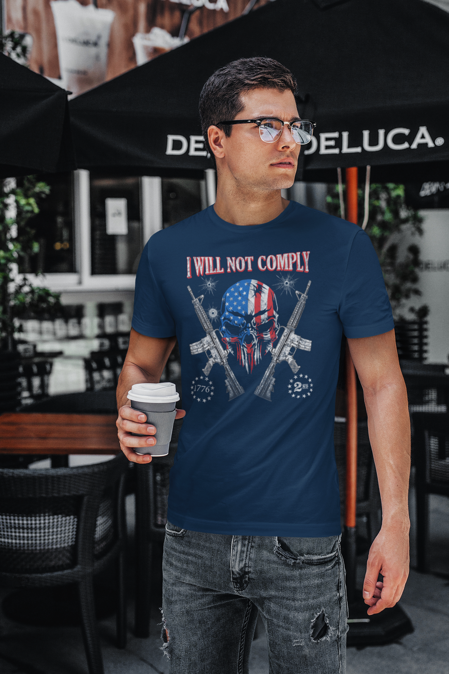 I Will Not Comply Strong Message Casual Wear Tee worn by a man in a café, showcasing a bold graphic design.