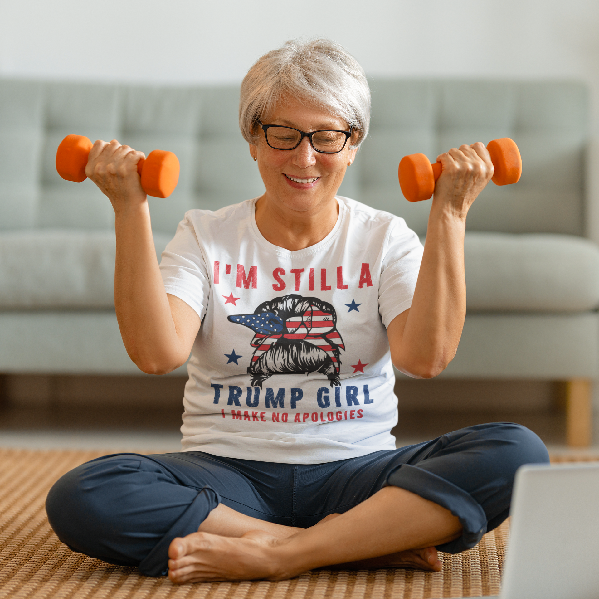 Woman exercising in Proud Trump Girl Official Style tee with dumbbells