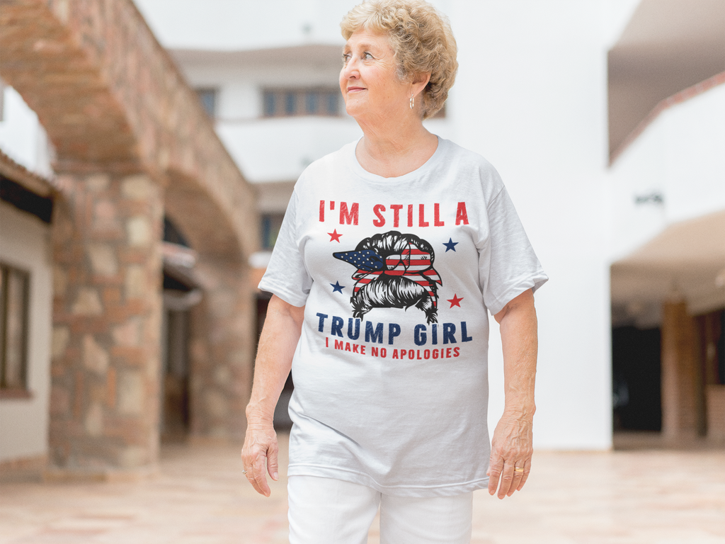 Woman wearing Proud Trump Girl Official Style tee shirt, patriotic design, expressing bold personal values in a stylish graphic tee.