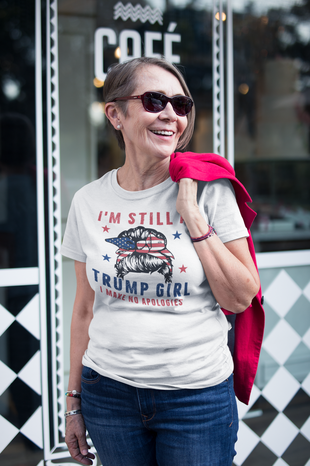 Woman wearing Proud Trump Girl Official Style t-shirt outside café