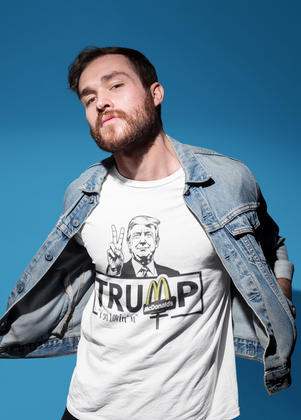 Man wearing Trump Lovin It Signature Design graphic tee, showcasing patriotism and personal values.