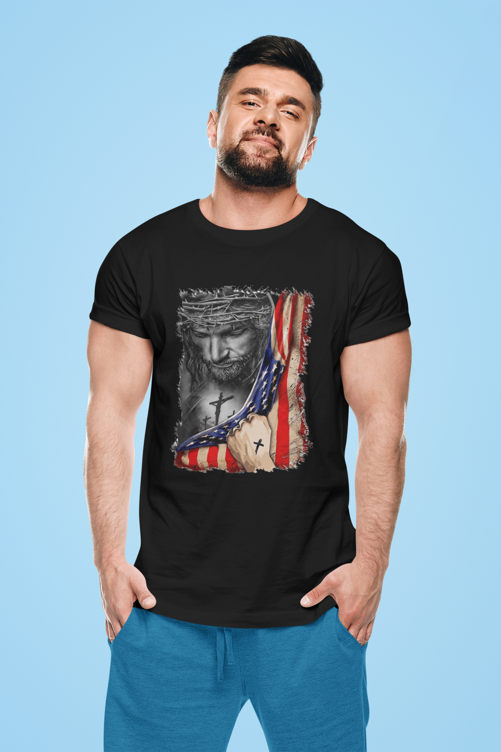 Model wearing Jesus in American Flag Faith Shirt with a graphic of Jesus holding an American flag.