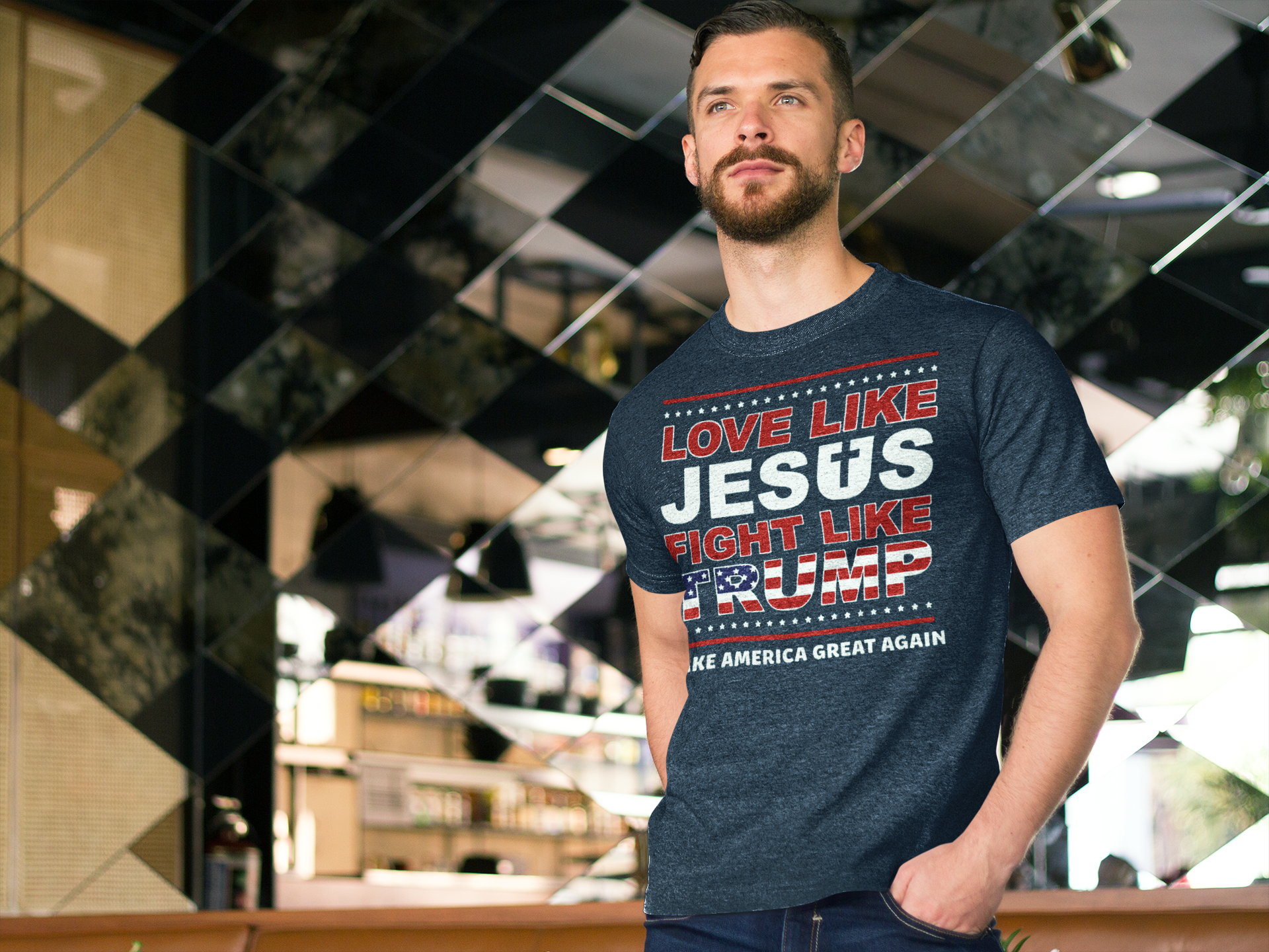 Love Like Jesus Fight Like Trump t-shirt worn by a man in a stylish setting with reflections in background.
