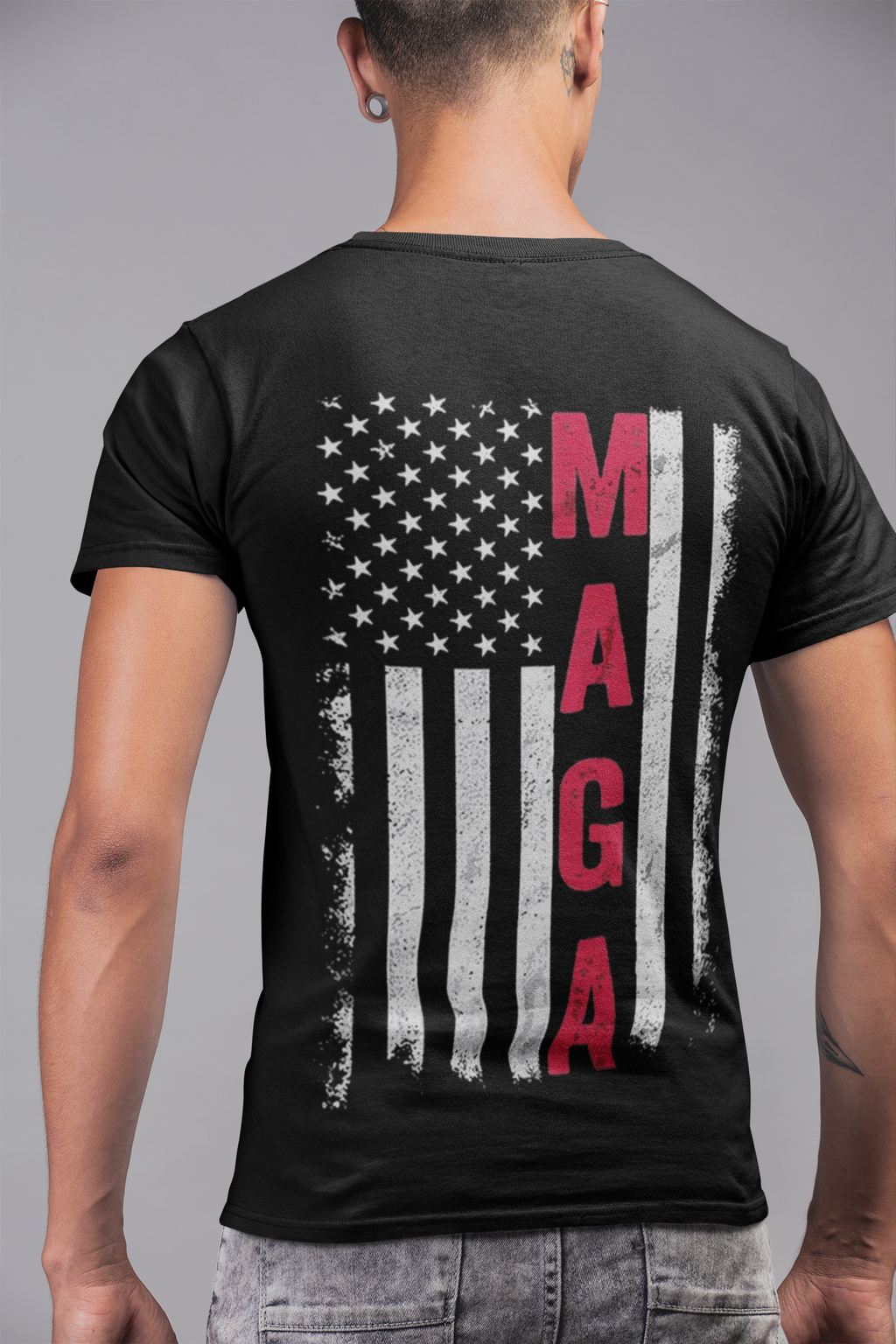 MAGA Black White Flag Graphic Shirt displayed on a model, featuring a distressed American flag design with MAGA text.