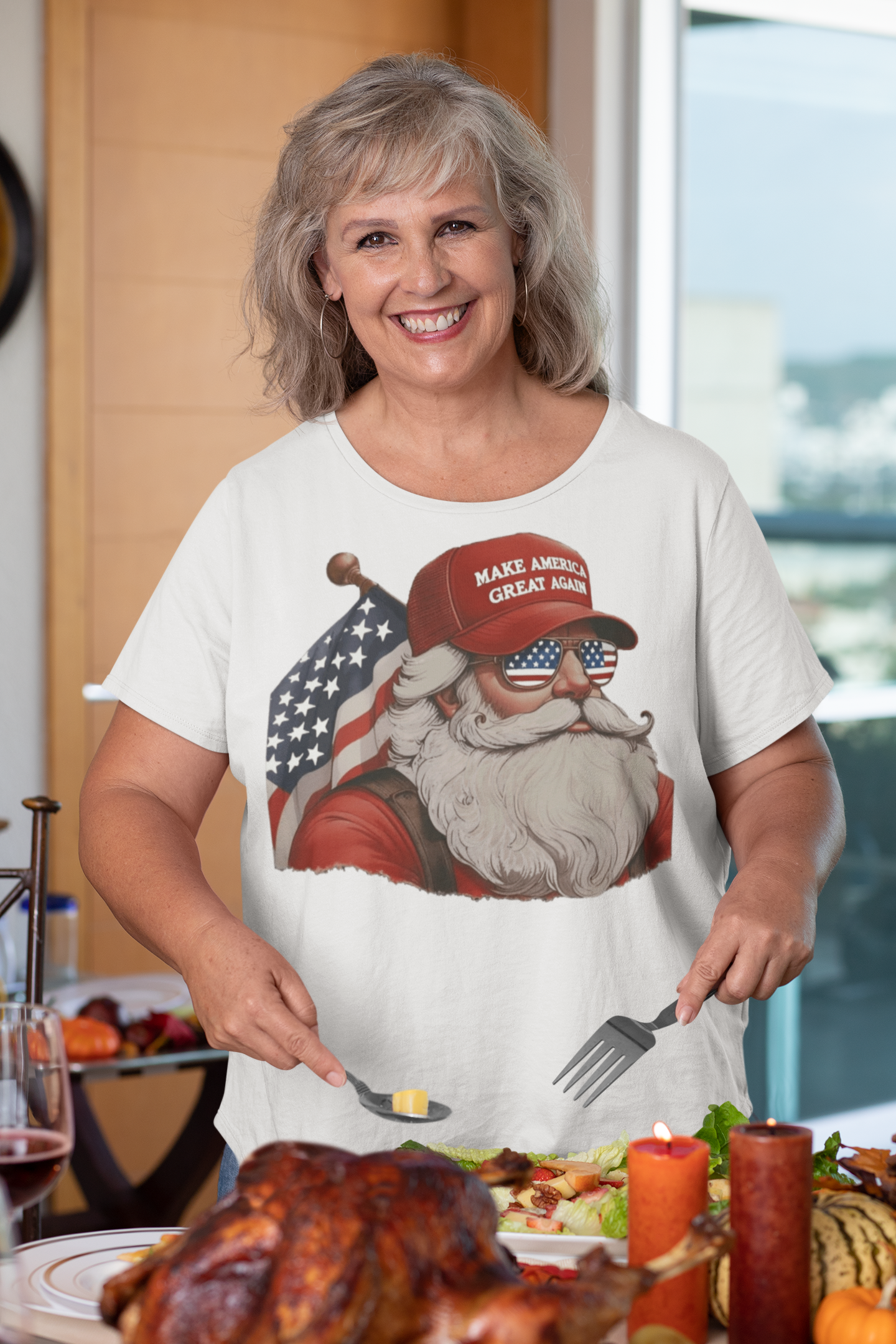 MAGA Santa With Flag Apparel Art worn by a smiling woman at a holiday dinner table with festive food.