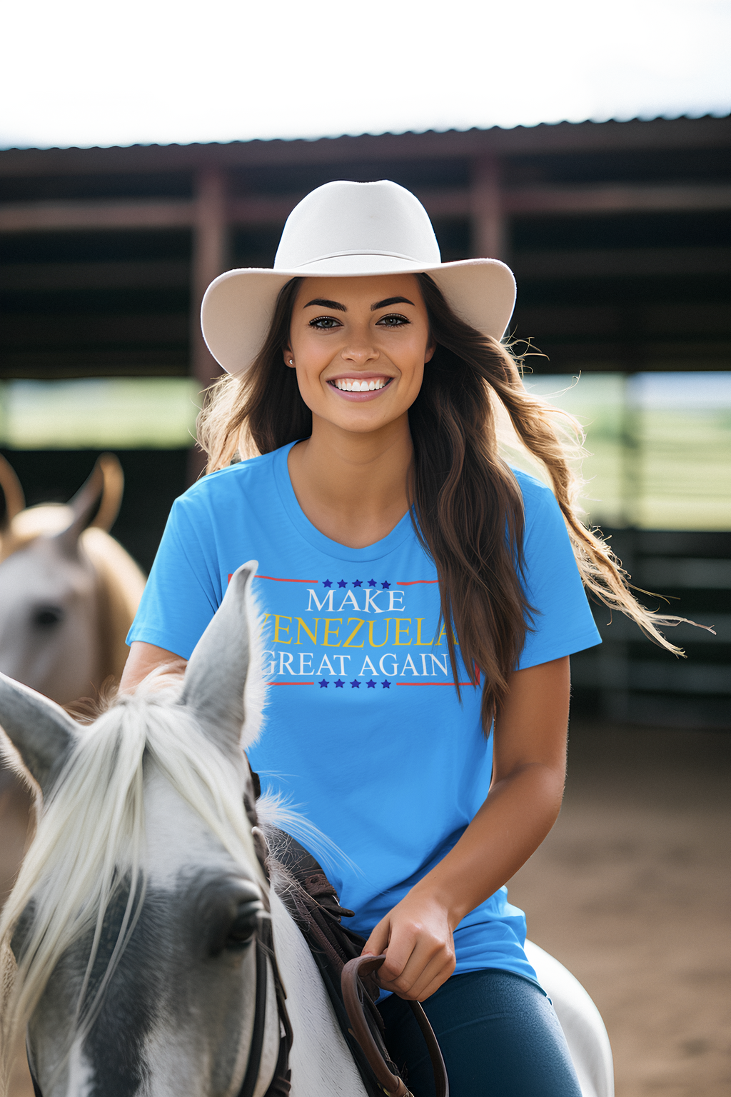 A woman wearing a blue 'Make Venezuela Great Again Stylish Graphic Apparel' shirt while riding a horse.