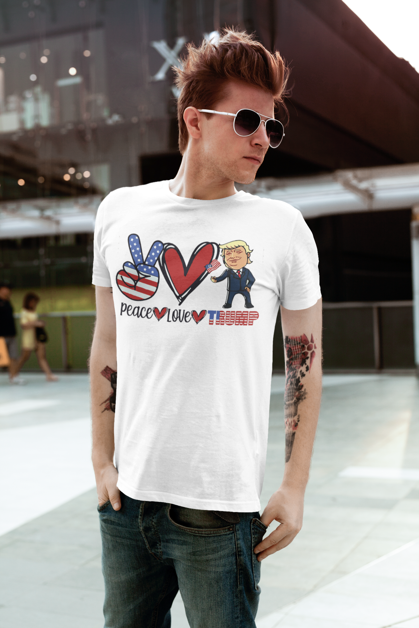 Person wearing a Peace Love Trump Patriotic Design t-shirt outdoors with a trendy graphic and retro aesthetic.