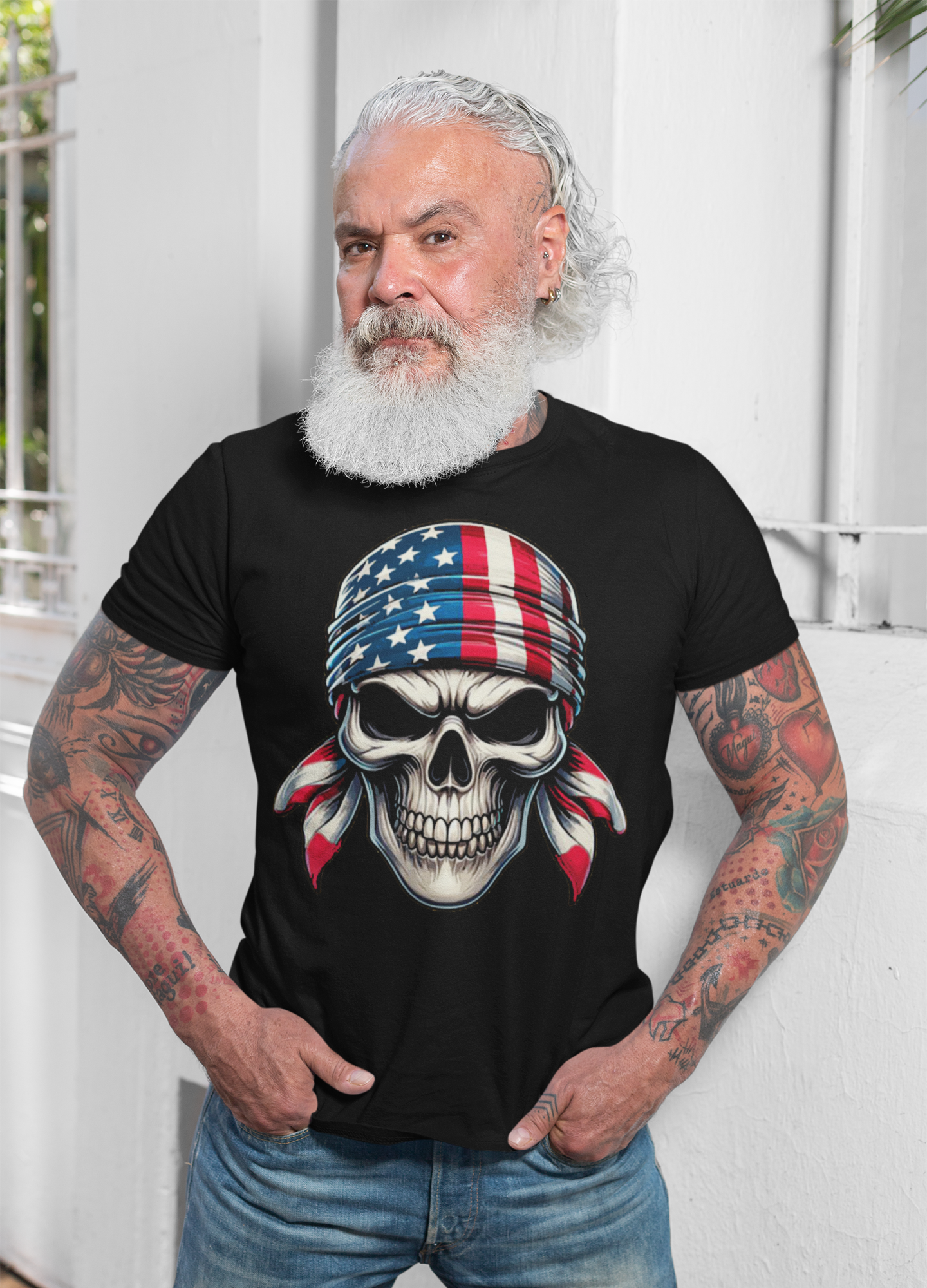 Skull Wrapped In American Flag Design t-shirt model wearing in a casual setting with tattoos.