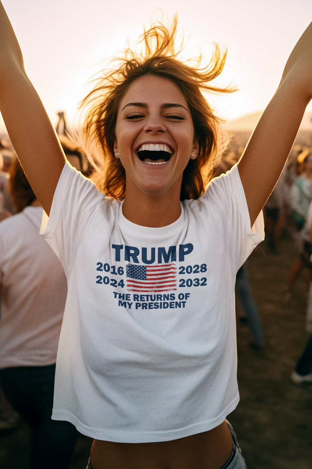 Cheerful person in a white t-shirt celebrating at an event, wearing 'Trump The Returns Of My President' design.