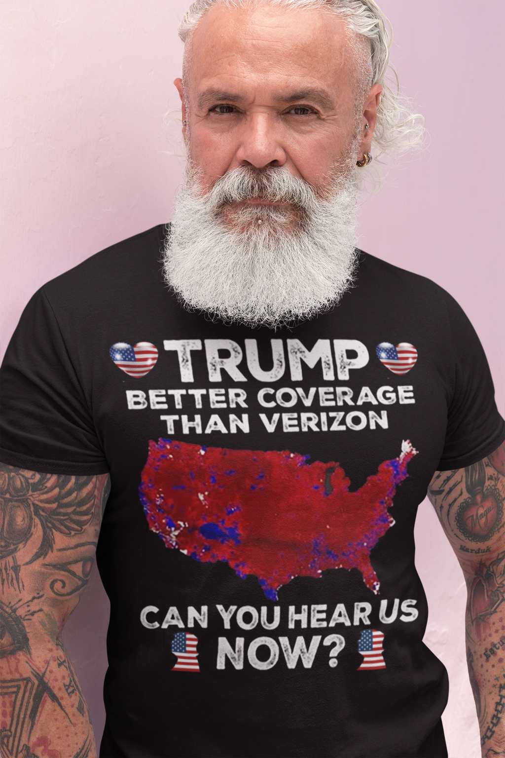 Man wearing a graphic tee that reads 'TRUMP BETTER COVERAGE THAN VERIZON' featuring a map of the USA.