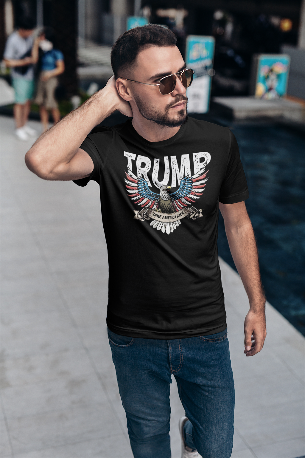 Man wearing a black t-shirt featuring the Trump Eagle In Stars And Stripes Take America Back design.