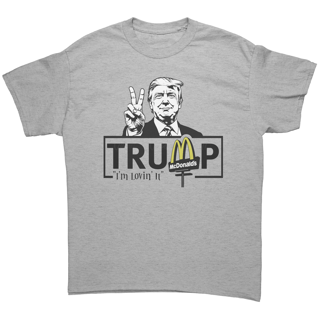 Trump Lovin It Signature Design graphic tee featuring a smiling Trump with peace sign and McDonald's logo.
