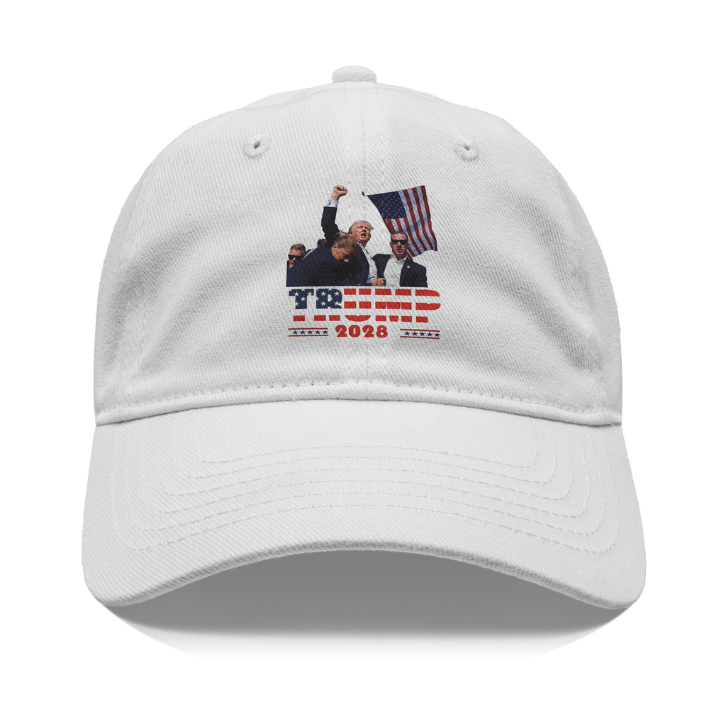 White cap featuring Trump Shot 2028 Graphic Design with patriotic elements and graphic of a rally.