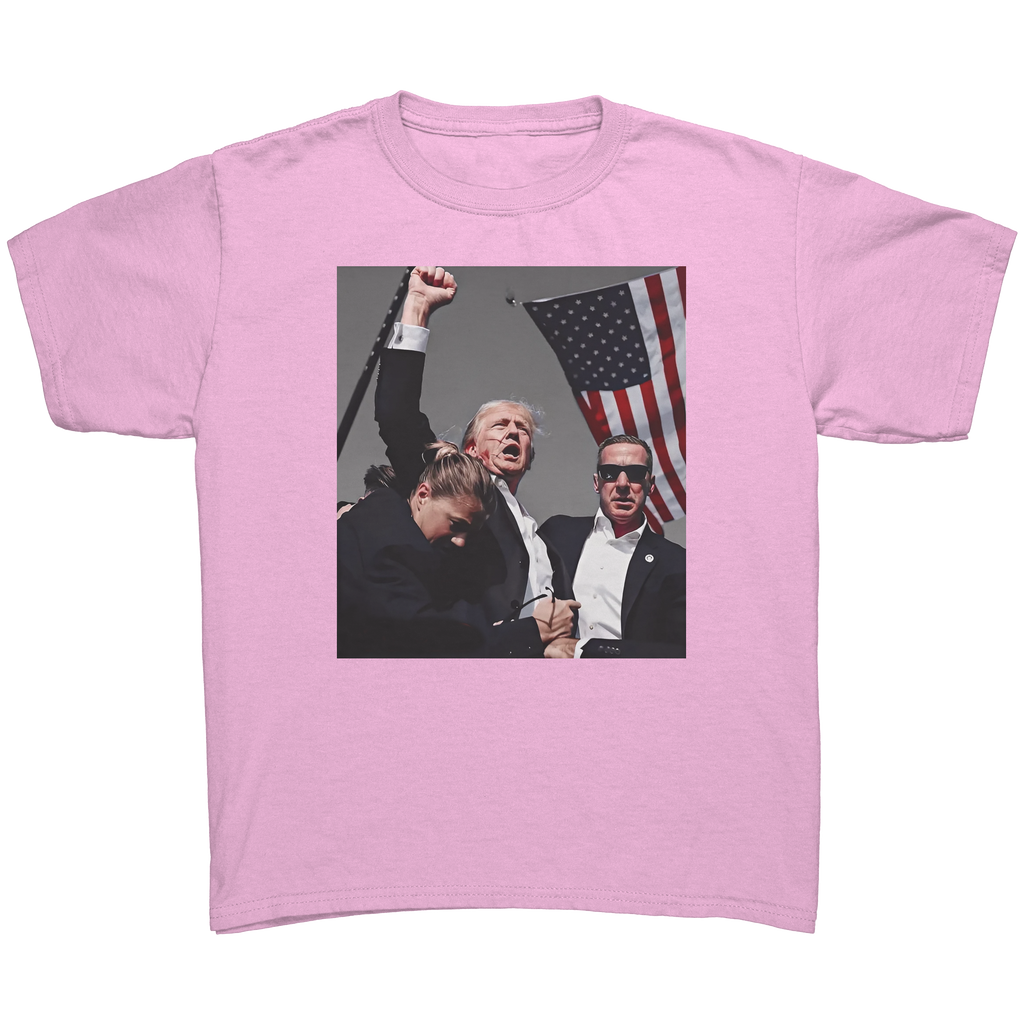 Graphic tee featuring the Trump Shot Commemorative Apparel design with a patriotic theme and bold colors.
