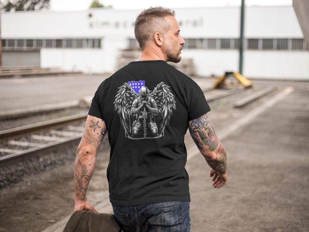 Man wearing Veteran With Wings Back Art Tee with winged design and American flag.