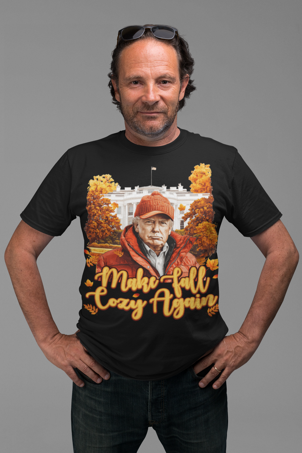Person wearing a Make Fall Cozy Again Seasonal Shirt standing in front of autumn trees and the White House.