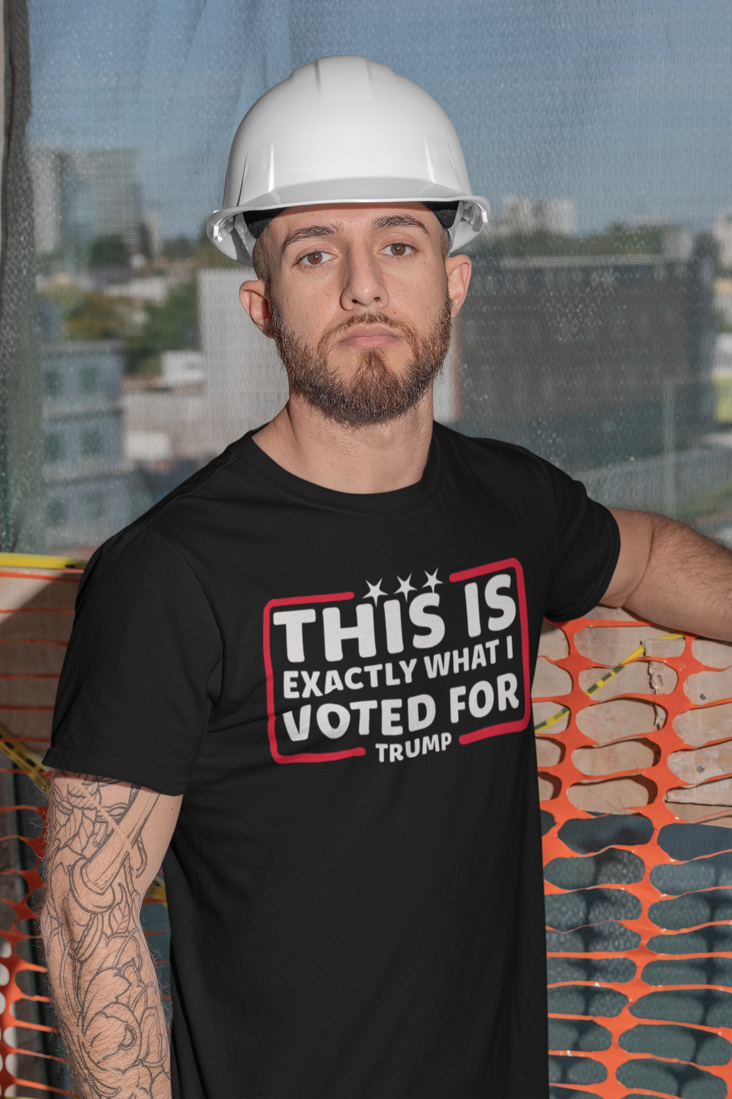 Man wearing a black t-shirt that says This Is Exactly What I Voted For, proudly showcasing political pride.