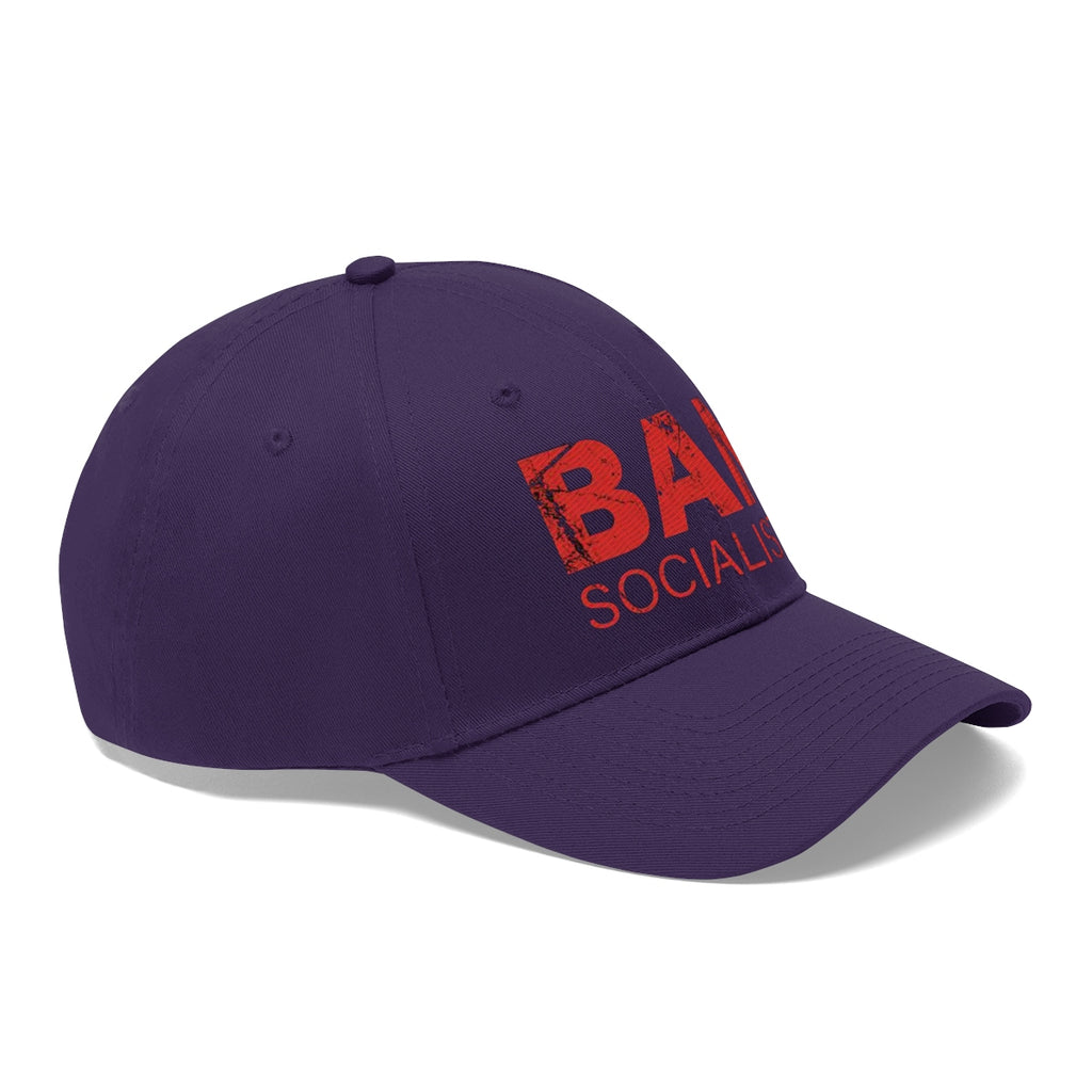 Ban Socialists Twill Cap Bold Message Graphic Cap in purple with bold red lettering.