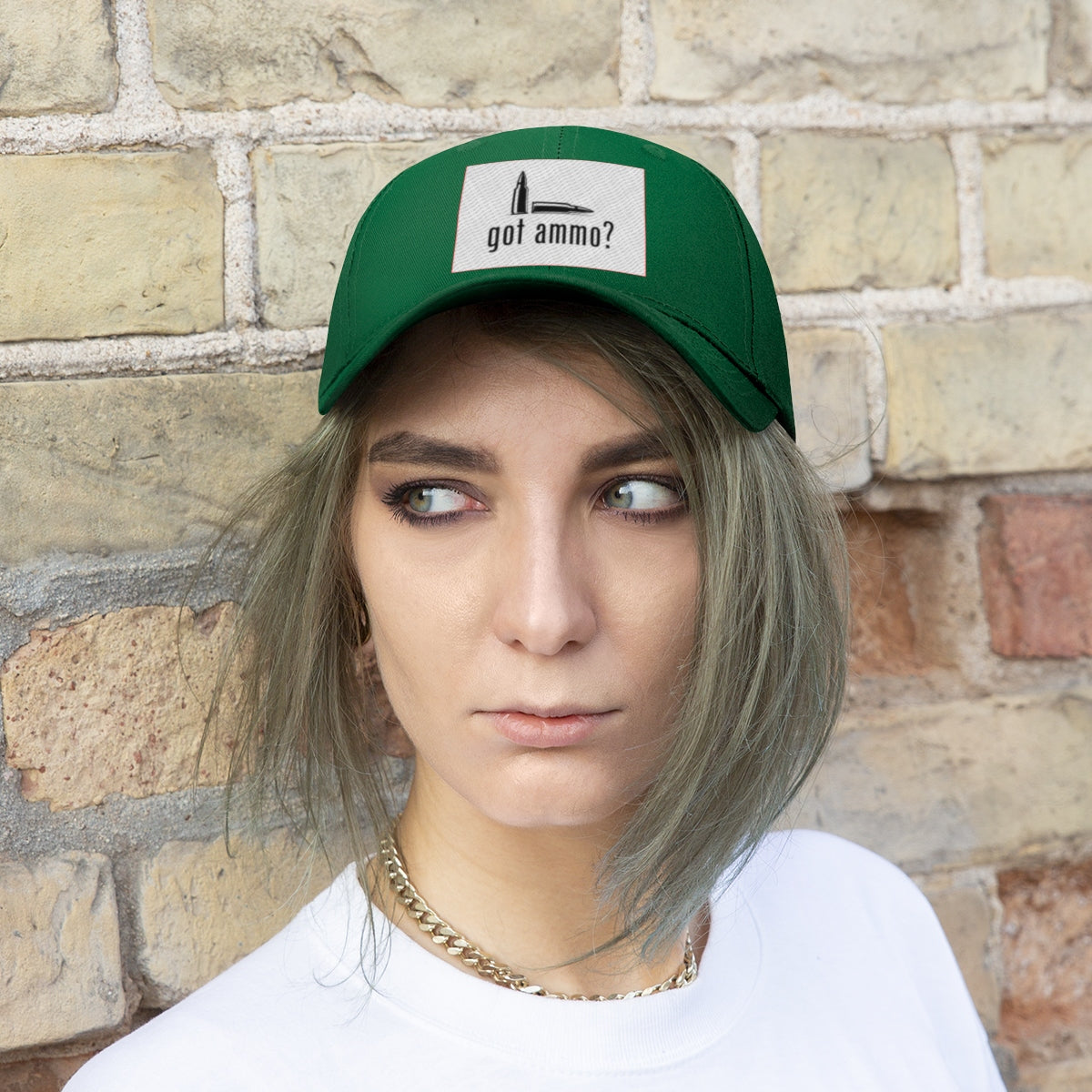 Got Ammo Twill Cap Funny Tactical Style Cap worn by a model against a brick wall.