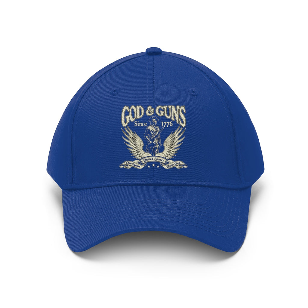 God And Guns Since 1776 Twill Cap in blue with emblem featuring wings and firearms symbols