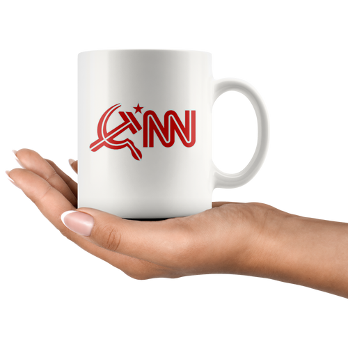Ceramic white mug with the design CNN Logo As Hammer & Sickle Wht held in hand, featuring high gloss finish and ORCA coating for vibrant color.