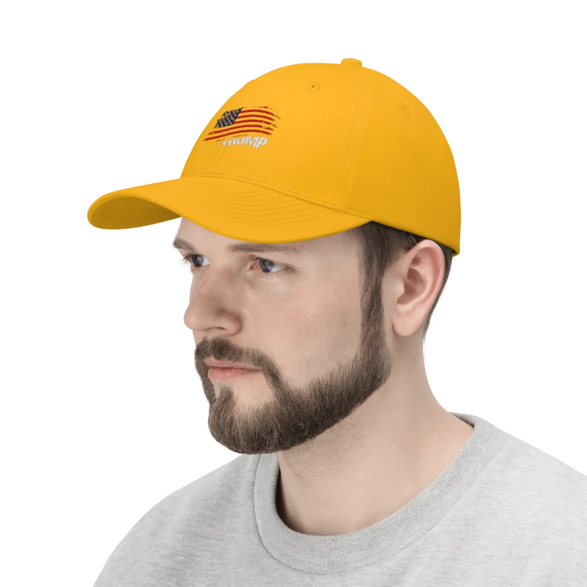 American Flag Twill Cap Trump Bold Supporter Cap worn by a man with a beard, featuring bold Trump embroidery.