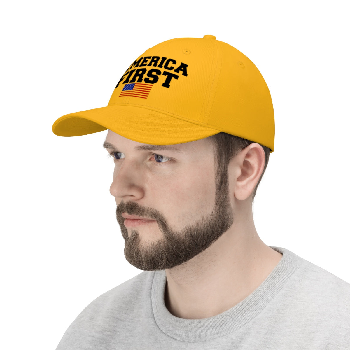America First Patriotic Twill Cap worn by a man, showcasing national pride with bold lettering and an American flag.