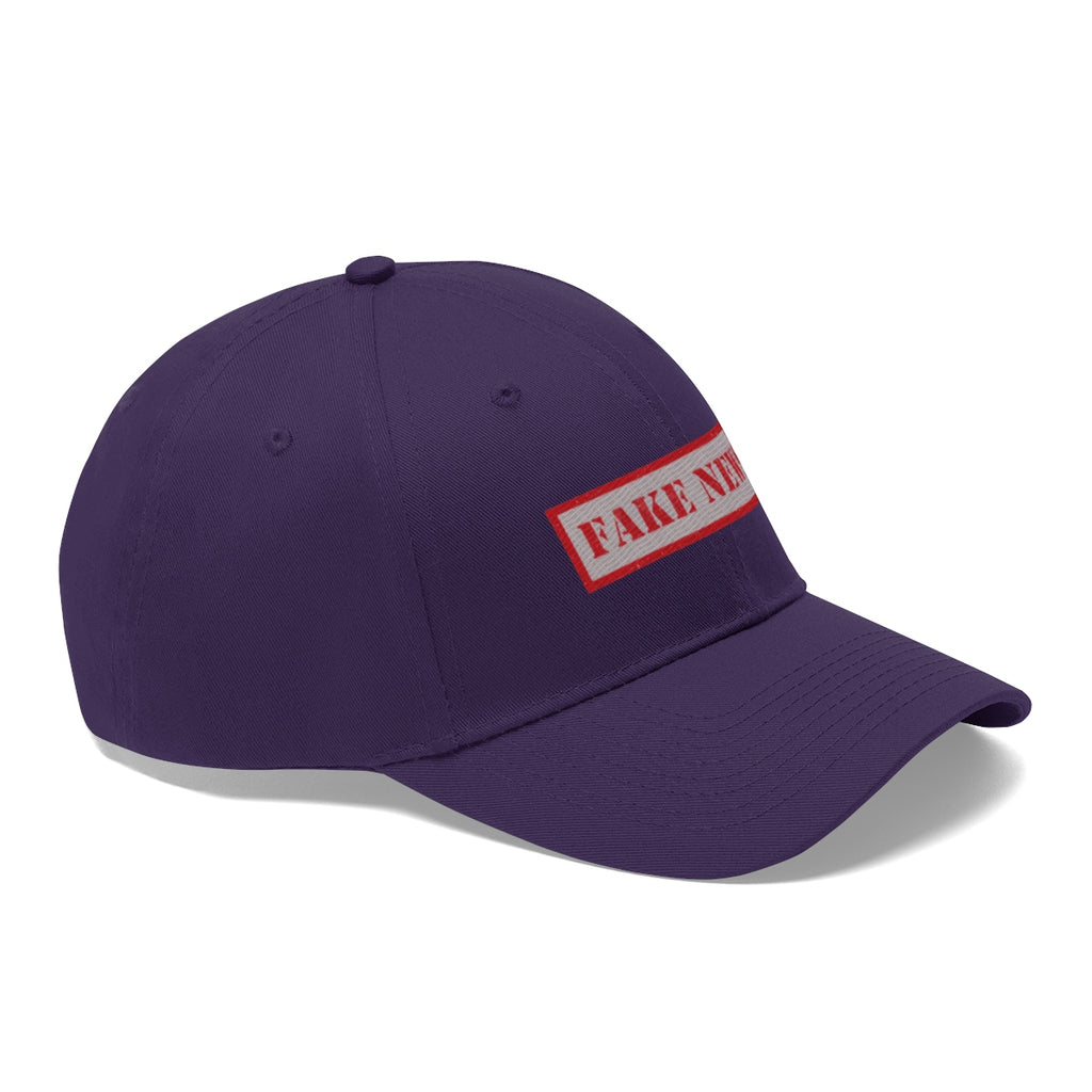 Fake News Twill Cap Bold Humor Casual Wear Hat in purple with bold red lettering.