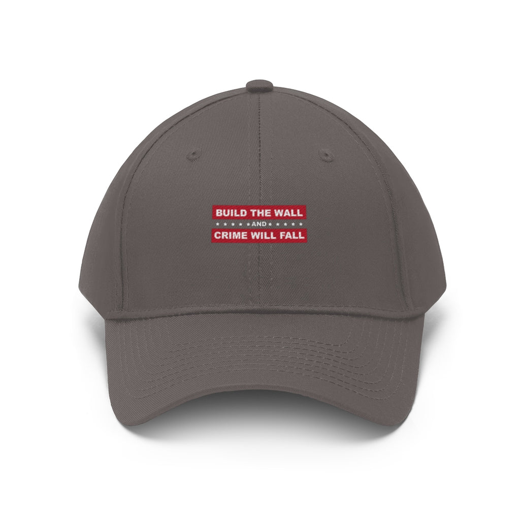 Build The Wall And Crime Will Fall Twill Cap with bold text design on gray fabric.