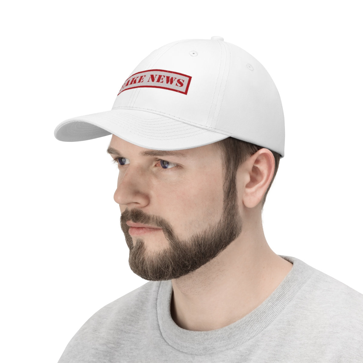 Fake News Twill Cap Bold Humor Casual Wear Hat modeled by a man, showcasing its playful design and stylish appeal.